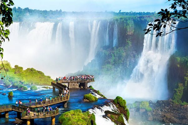 Tourists at Iguazu Falls, one of the world's great natural wonders, on the border of Brazil and Argentina.